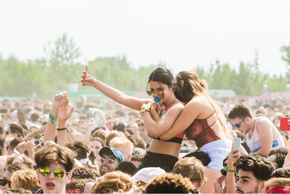 People enjoying an outdoor concert